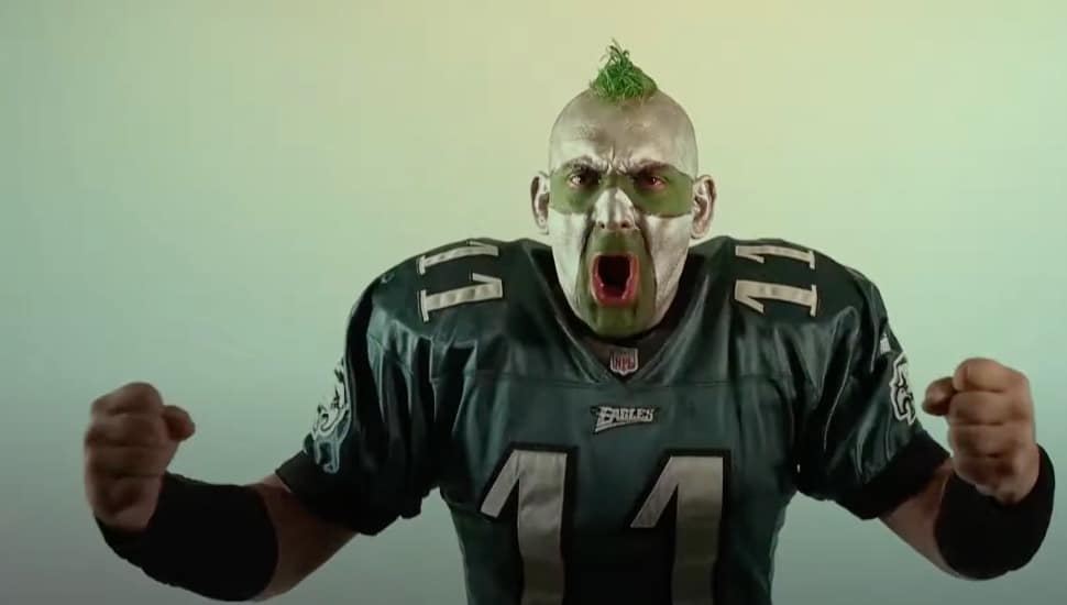 Philly Sports Guy wearing green paint and Eagles shirt.