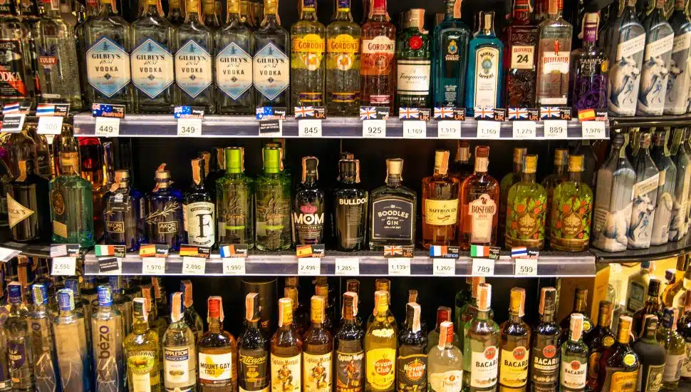 Bottles of alcohol on shelves.
