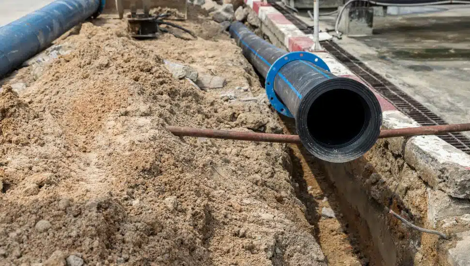 Construction site with new Water Pipes in the ground.