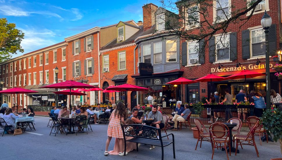 People dining outside in summer in West Chester.