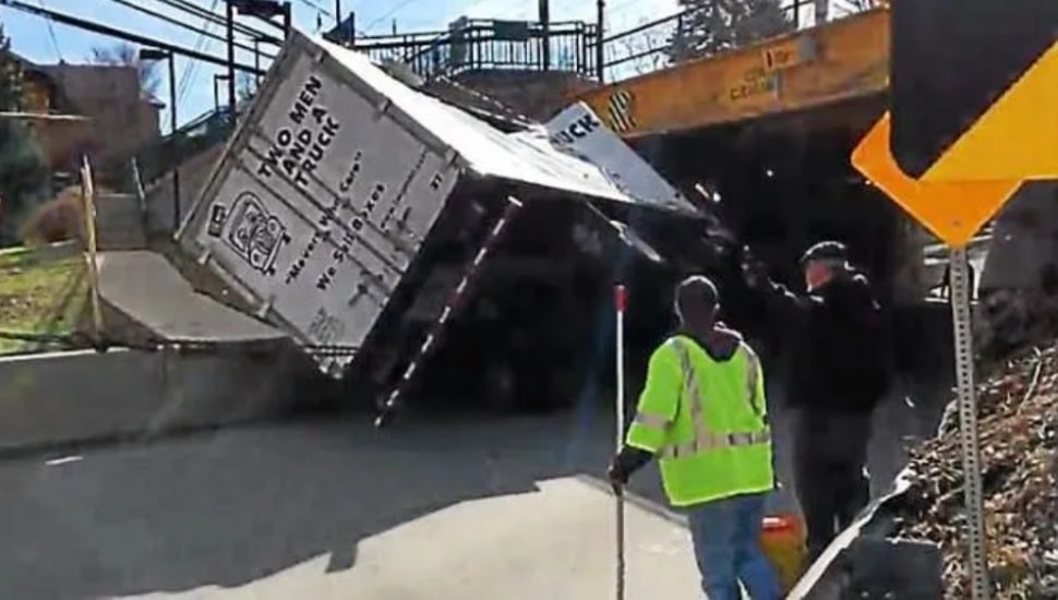 Amtrak bridge hit by truck.