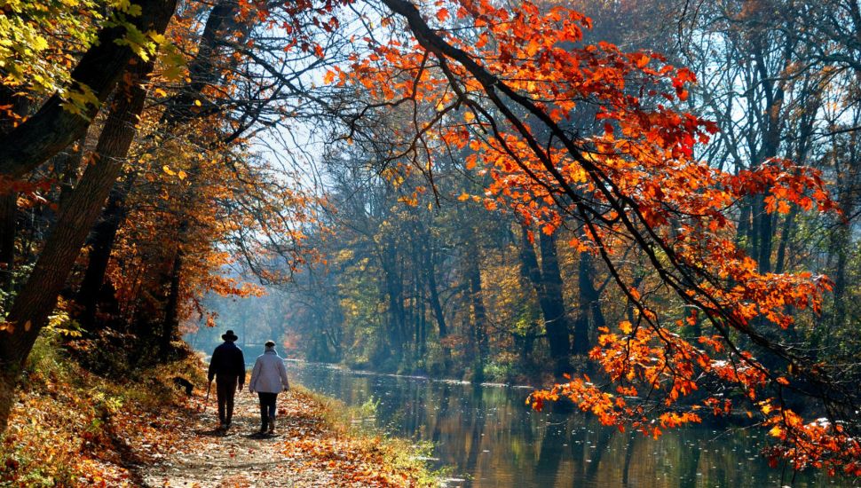 Couple walking on the Delaware Canal Towpath.