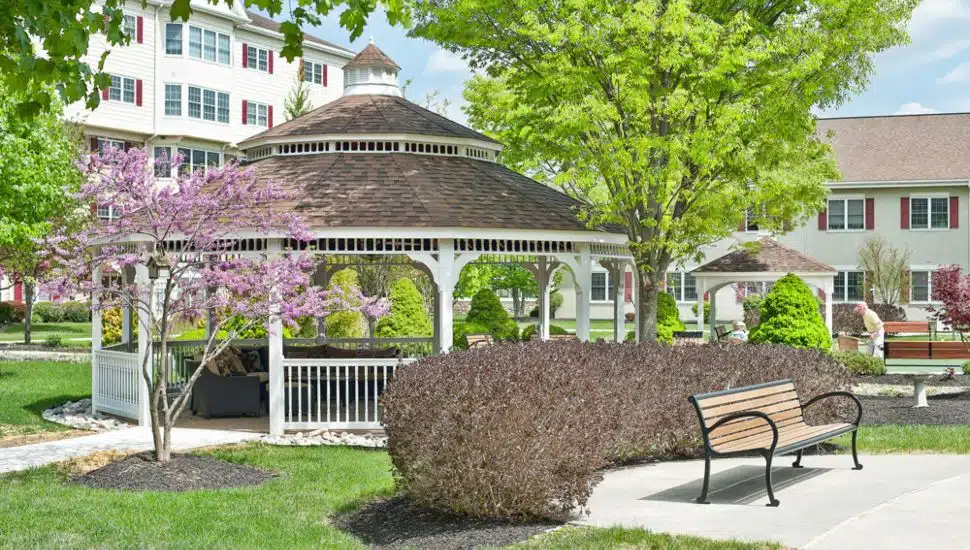 A gazebo and the outside of Freedom Village at Brandywine.