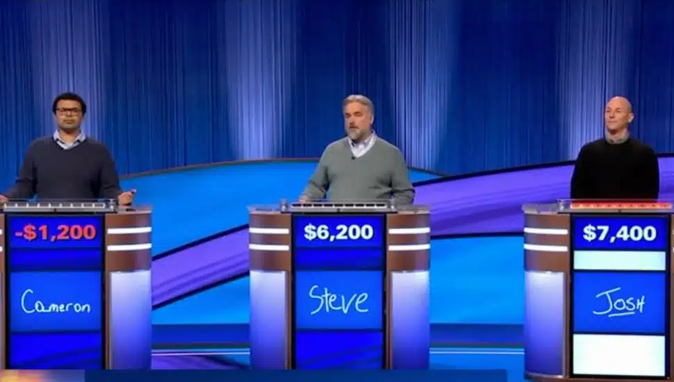 Three Jeopardy players, with Joshua Weikert on far right.