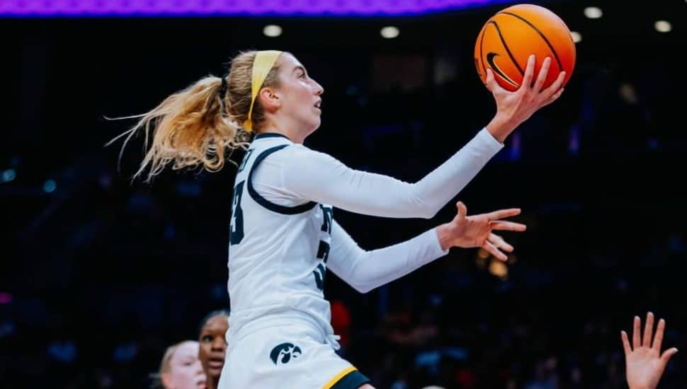 Lucy Olsen with a basketball.