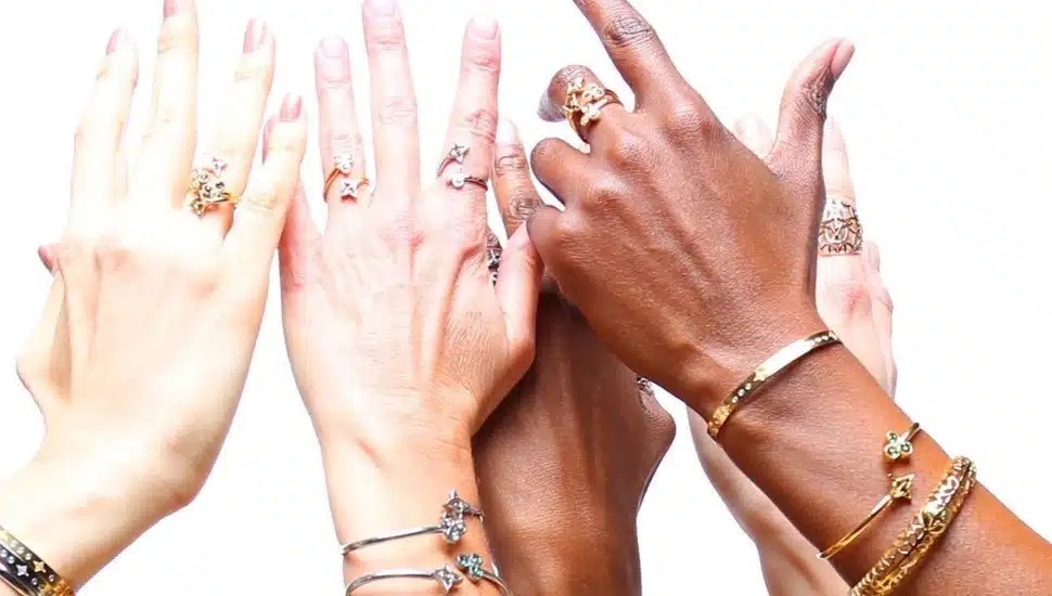 Valencia Key jewelry on hand models.