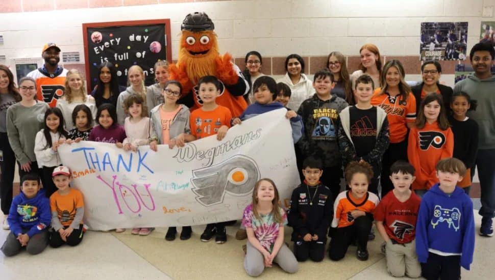 Elementary school students with Gritty.