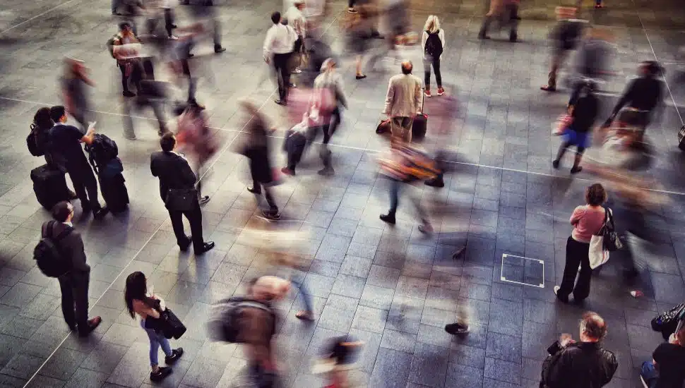 Crowds of blurred people walking.