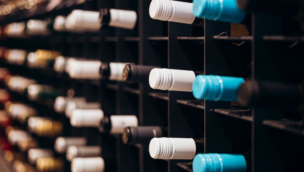 Wine bottles in wine cellar.