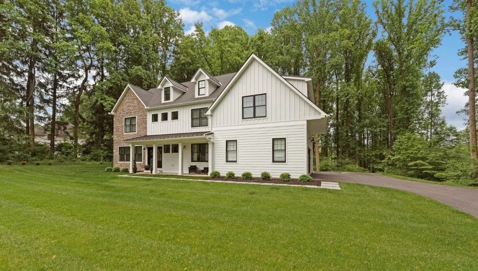 Brown and white house on green grass at 540 Worthington Rd.