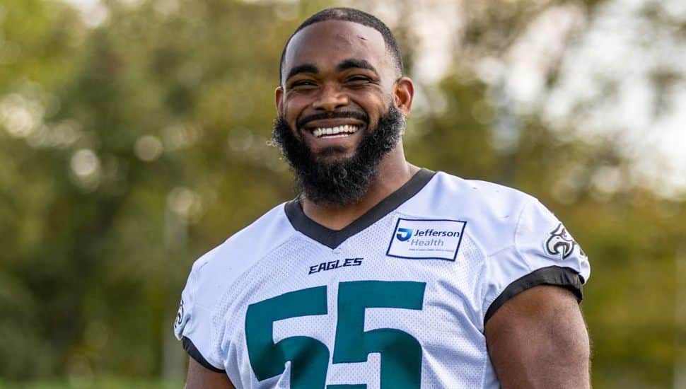 Brandon Graham smiling wearing number 55 jersey.