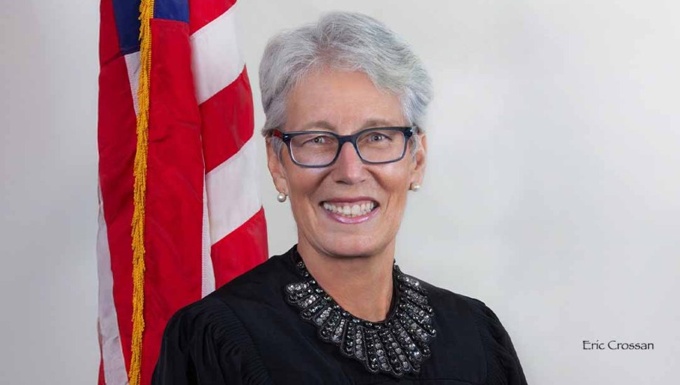 Headshot of Judge Jan R. Jurden positioned in front of the American flag.