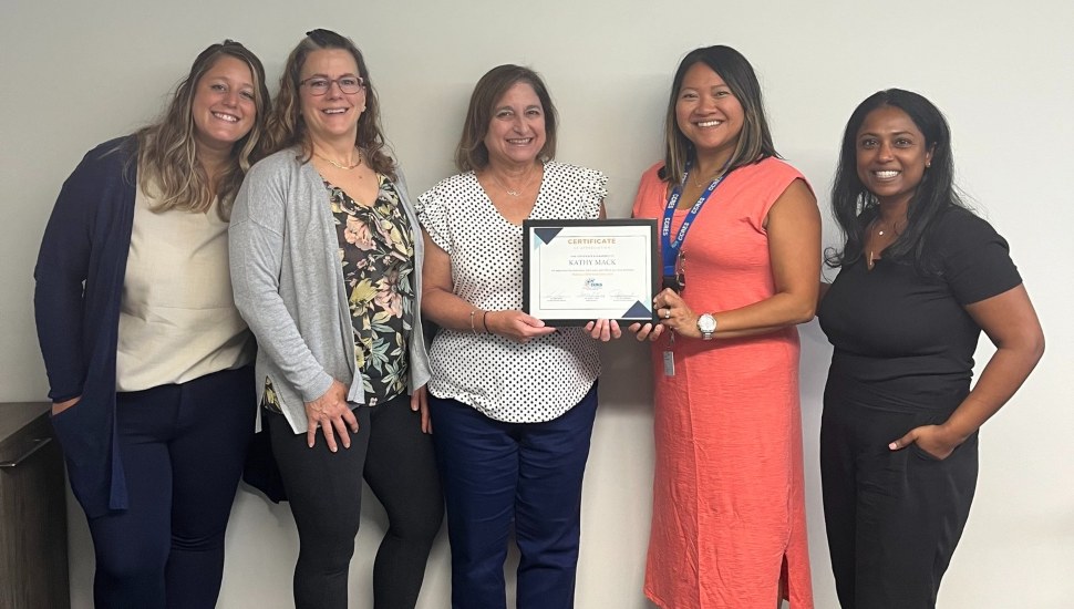 Kathy M. (third from left) was recently honored by the CCRES board for her outstanding service as a personal care assistant. With her are Keara Cosgrave (left), Pattie Richards (second from left), Thuy Yancey (fourth from left), and Mercy Alex.