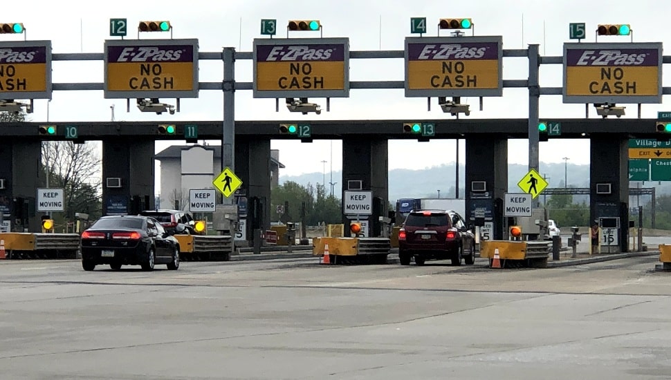 Cars traveling through King of Prussia toll booth.
