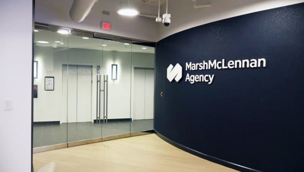 Marsh McLennan Agency logo on wall.