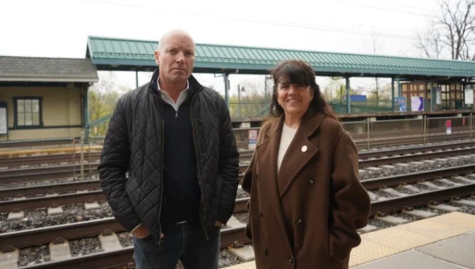 Ken Kearns stands with state Representative Lisa Borowski at the Paoli/Thorndale Regional Rail.