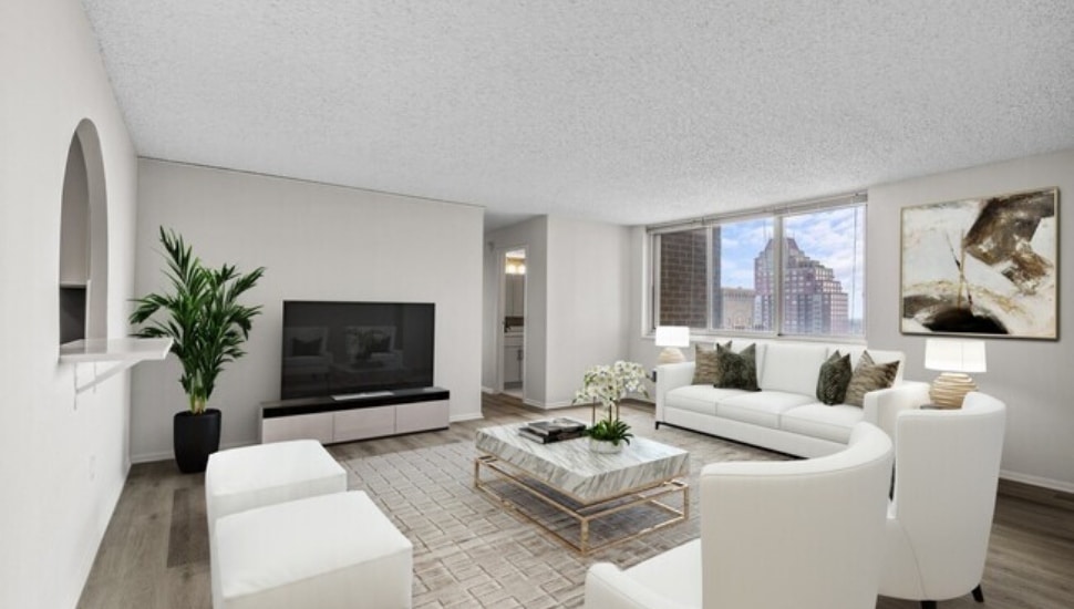Philadelphia apartment decorated with white and gray.