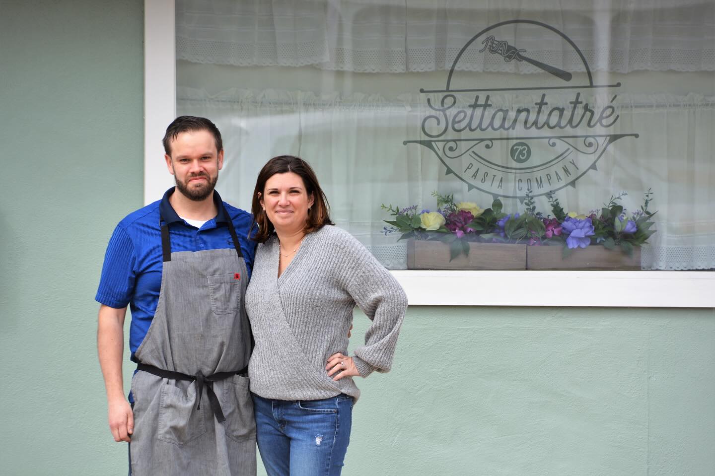Matt Gentile and Genna Curcio in front of Settantatré window.