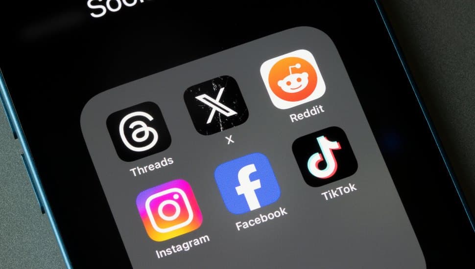Social media apps like Tiktok and Instagram on cell phone screen.