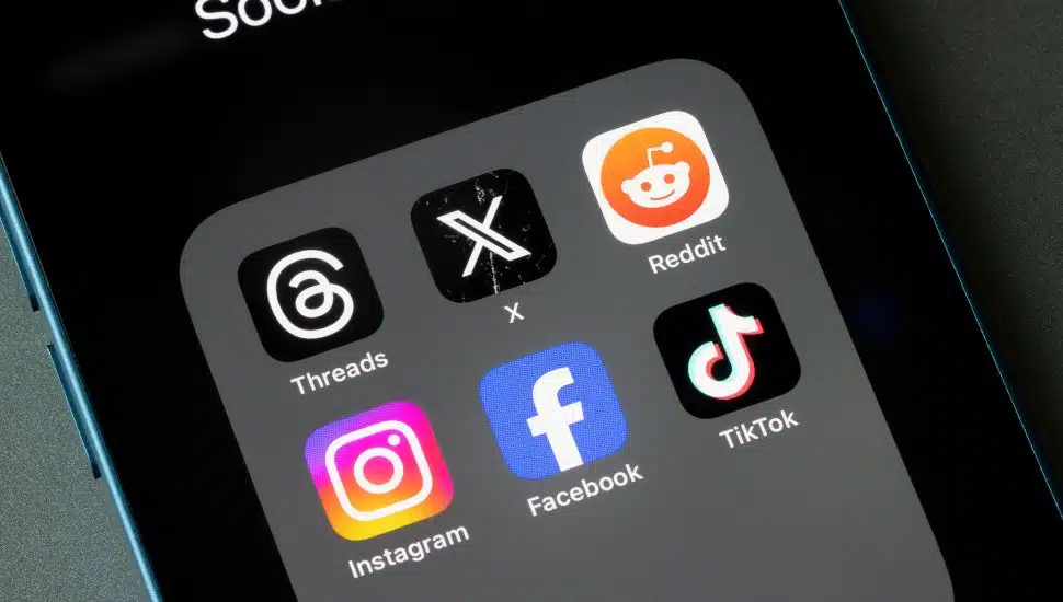 Social media apps like Tiktok and Instagram on cell phone screen.