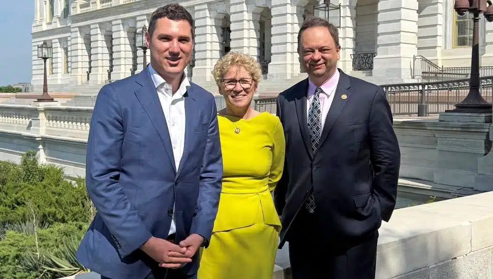 Rep Houlahan with Commissioner Maxwell, left, and local CEO David Byerman, right.