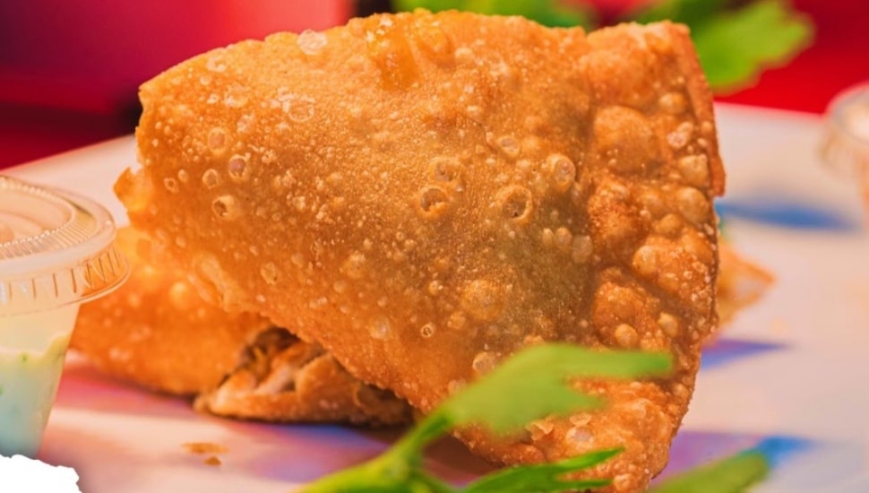 Empanadas on a plate, close up shot.