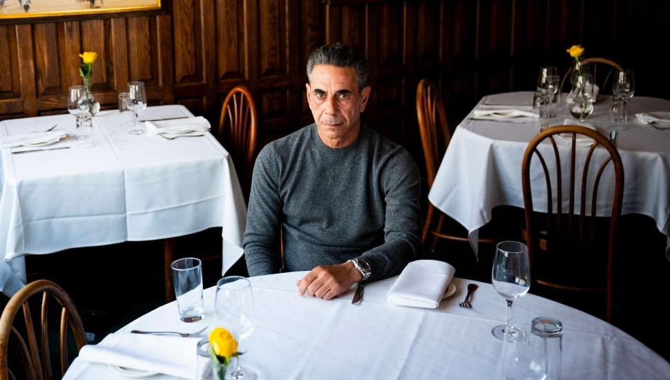 Joey Merlino at a table.