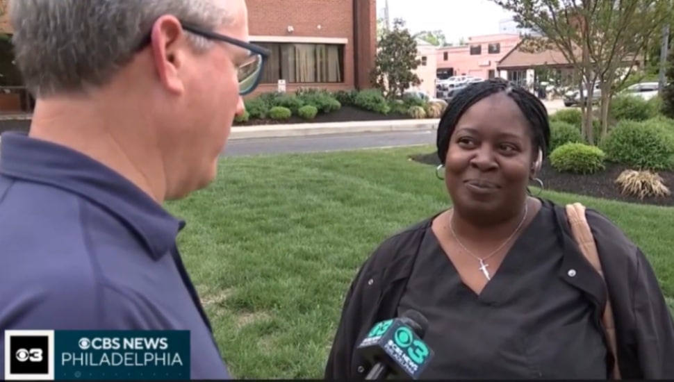 Malisha Eldridge talks with CBS reporter.