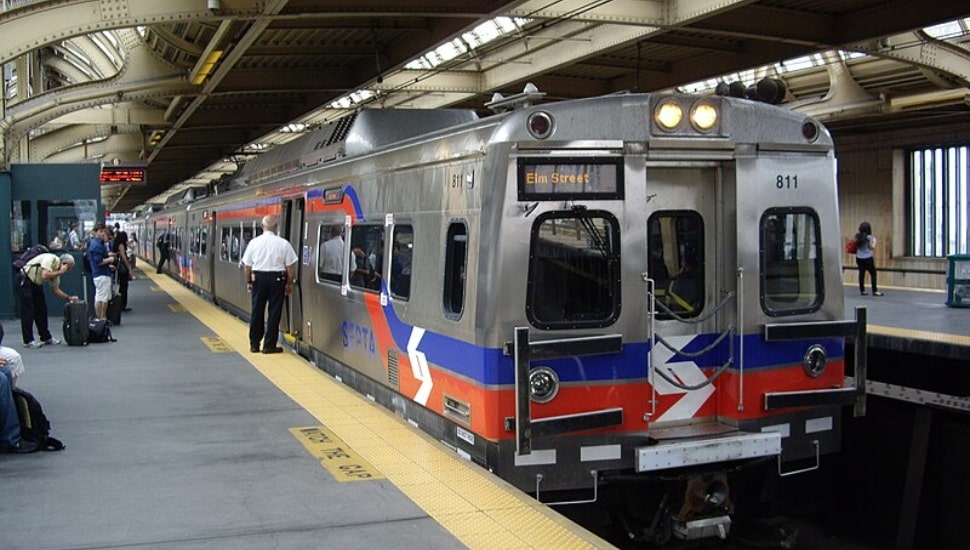 Regional Rail SEPTA train stopped at station.