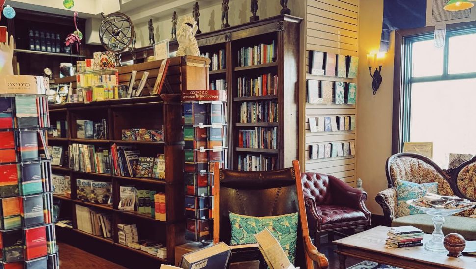 Wellington Square Bookshop interior with shelves of books and trinkets.
