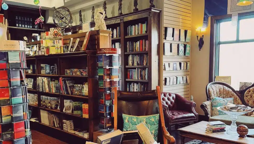 Wellington Square Bookshop interior with shelves of books and trinkets.