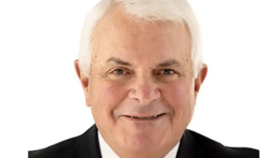 Headshot of Frank Palermo. He's an older man, white hair, smiling.