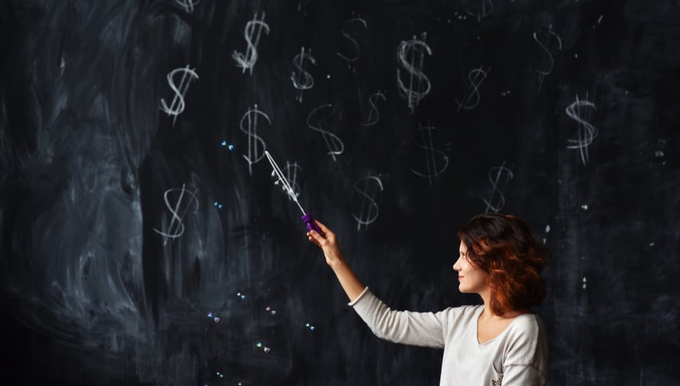 Teacher at a blackboard.