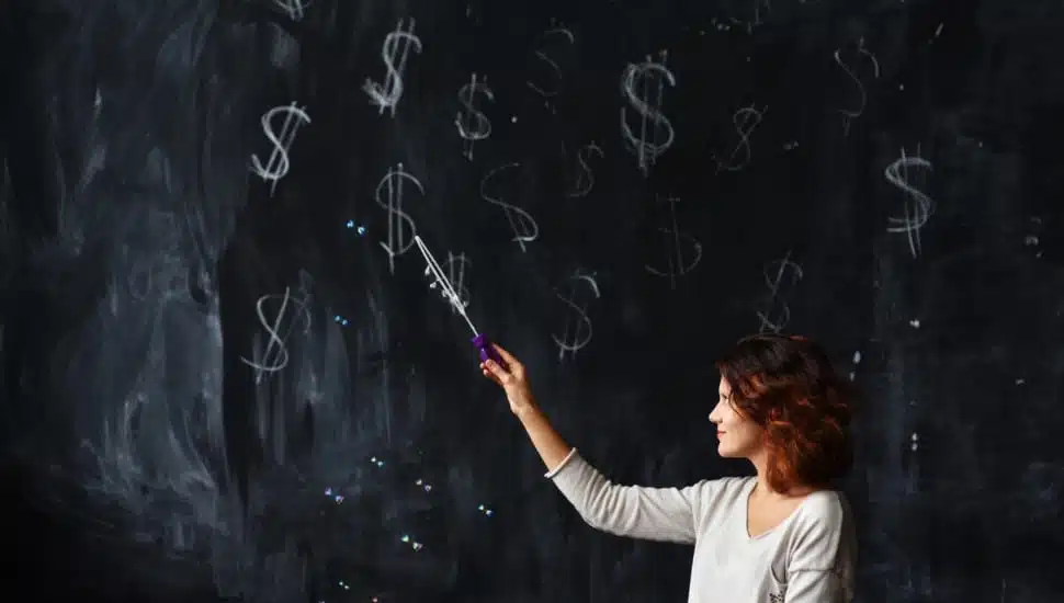 Teacher at a blackboard.