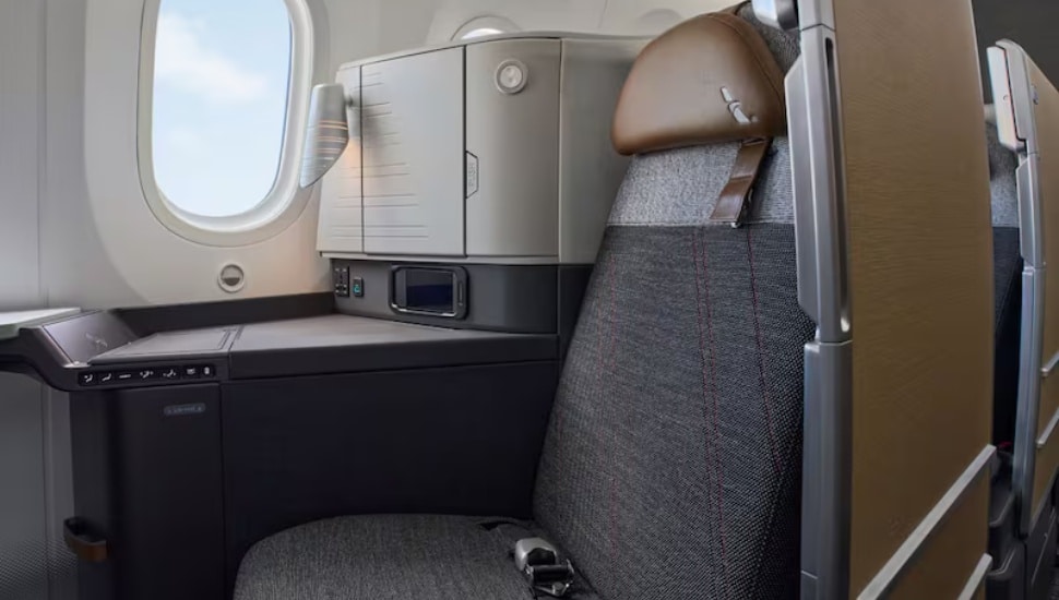 New gray and brown seat on American Airlines plane.