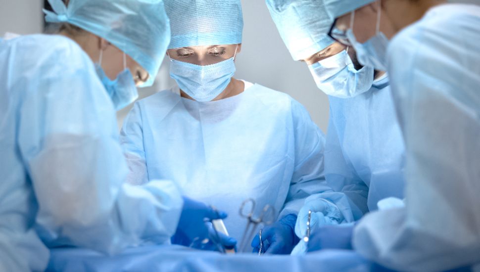 Doctors performs Cardiovascular surgery.