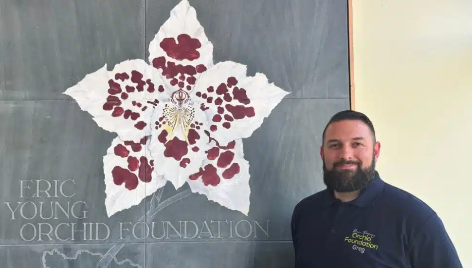 Orchid curator Greg Griffis at the Eric Young Orchid Foundation.