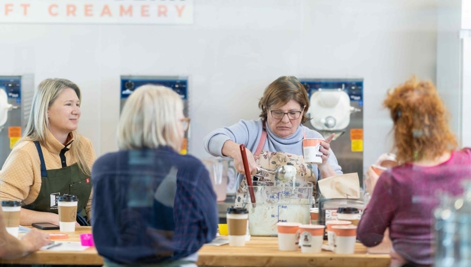 A group of participants making ice cream at Kennett Square's Hangry Bear Creamery.
