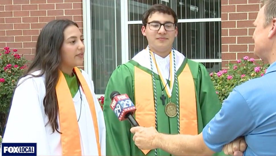 Leah and Elan Madanat talk to reporter after graduation.