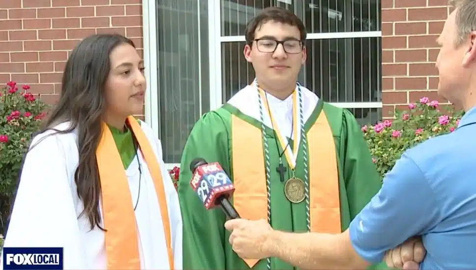 Leah and Elan Madanat talk to reporter after graduation.