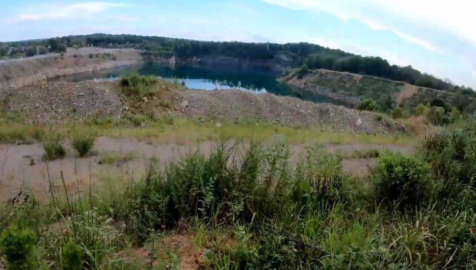 Stone and grass at quarry.