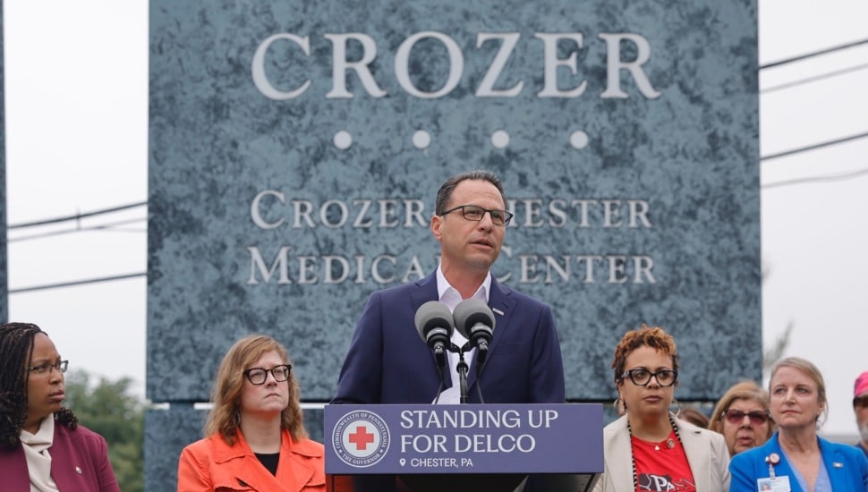 Josh Shapiro speaking at a podium.