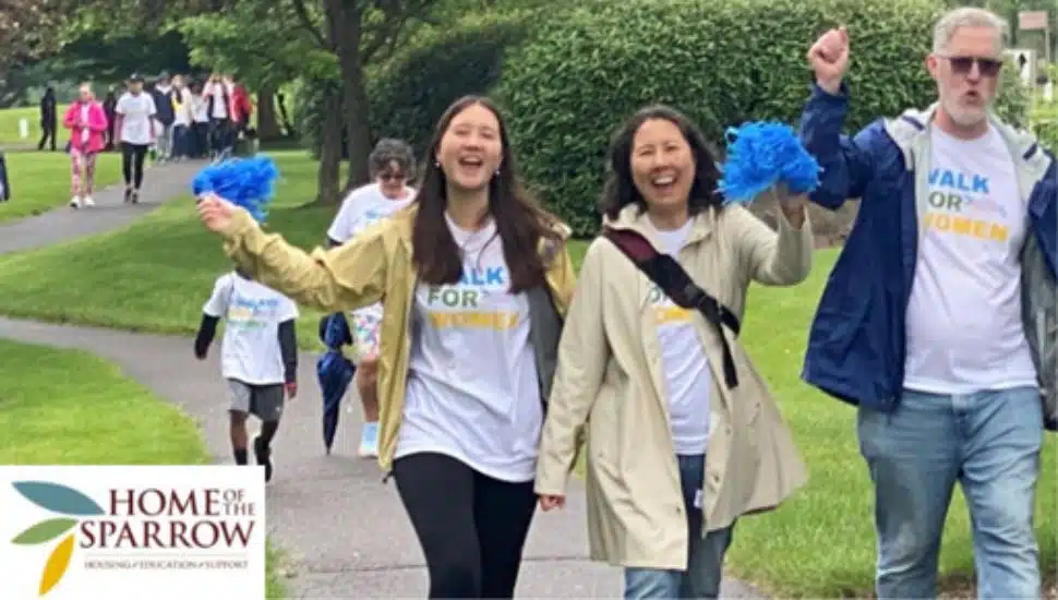 Supporters cheer as they participate in the Home of the Sparrow's Walk for Women.