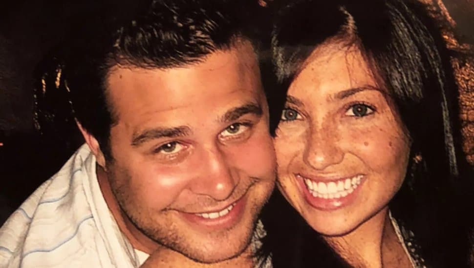 Sam Goldberg and Ellen Greenberg smile together.