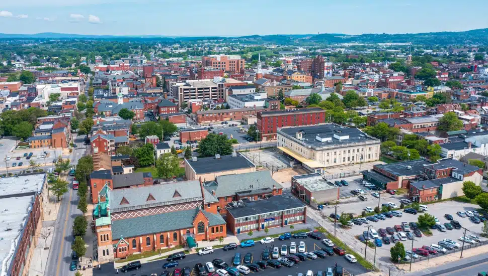 An aerial view of buildings and cars throughout a suburban Pennsylvania town.