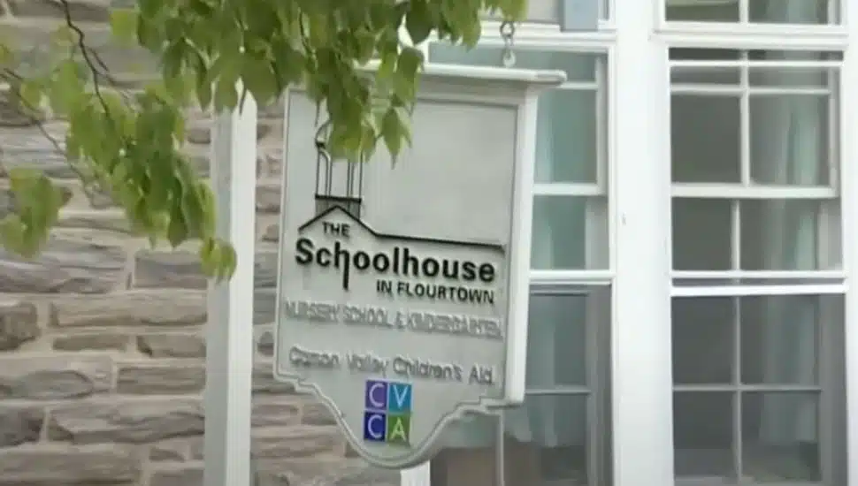 The sign outside of the closing Schoolhouse of Flourtown.