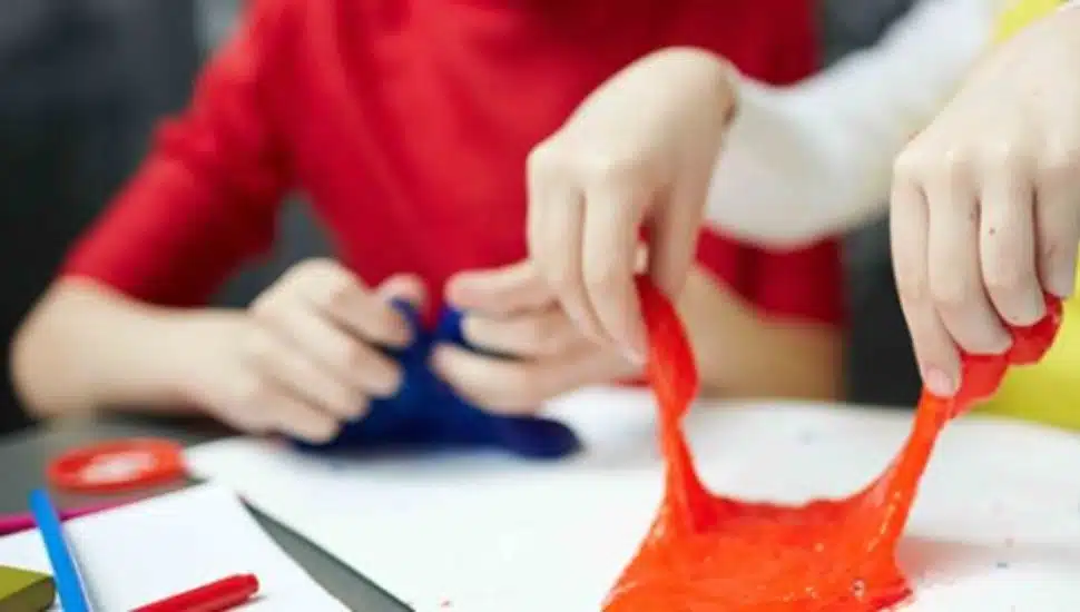 Children playing with colorful slime.
