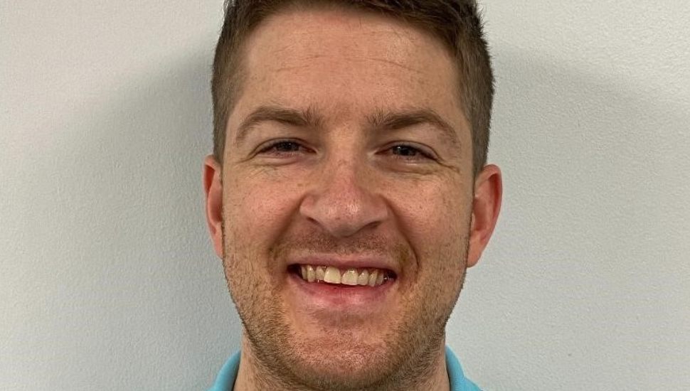 Headshot of Benjamin Zelner, PT, DPT, OCS, smiling, physical therapist at Chester County Hospital who leads a free community back health program.