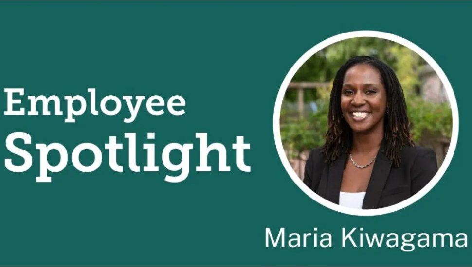 Employee Spotlight graphic featuring Maria Kiwagama, smiling in a professional headshot with a green background.