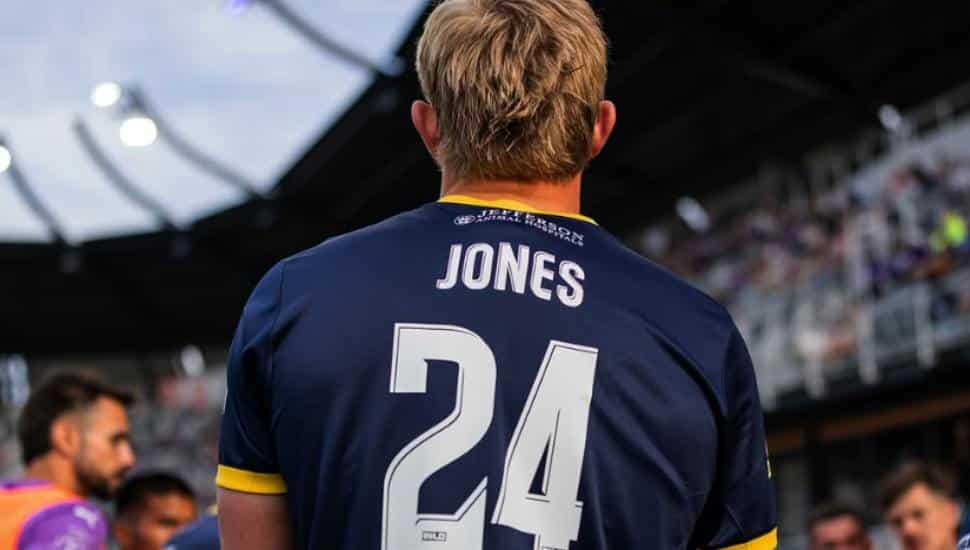 Josh Jones from back with Jones on his navy colored jersey.
